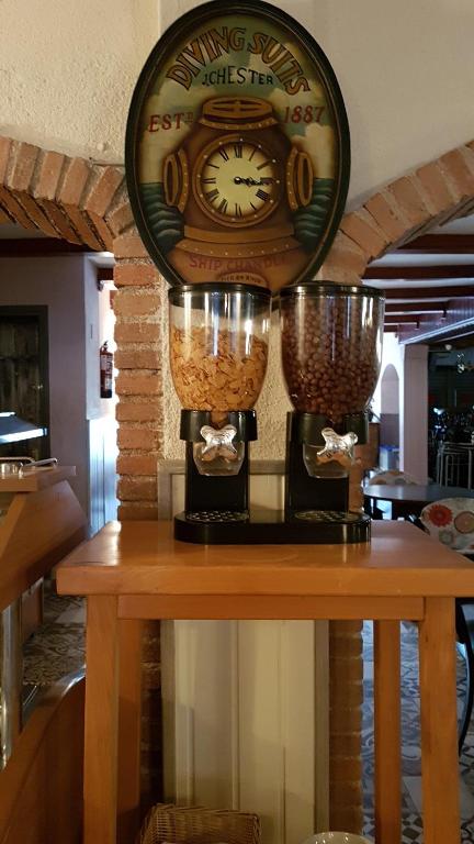 Kuchyň nebo kuchyňský kout v ubytování Hostal Isabel