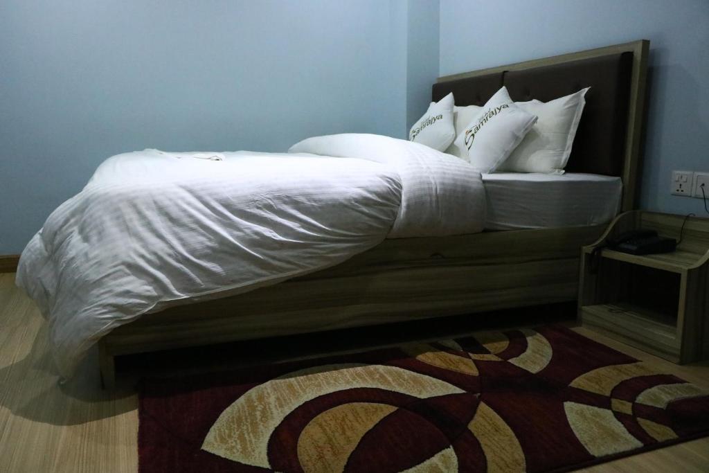 Postel nebo postele na pokoji v ubytování Hotel Samrajya Pvt. Ltd.