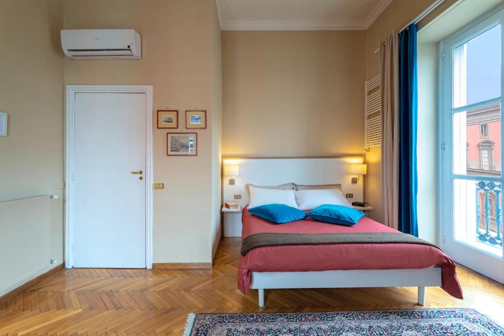 Posteľ alebo postele v izbe v ubytovaní Il Ventre Di Napoli " Costantinopoli"