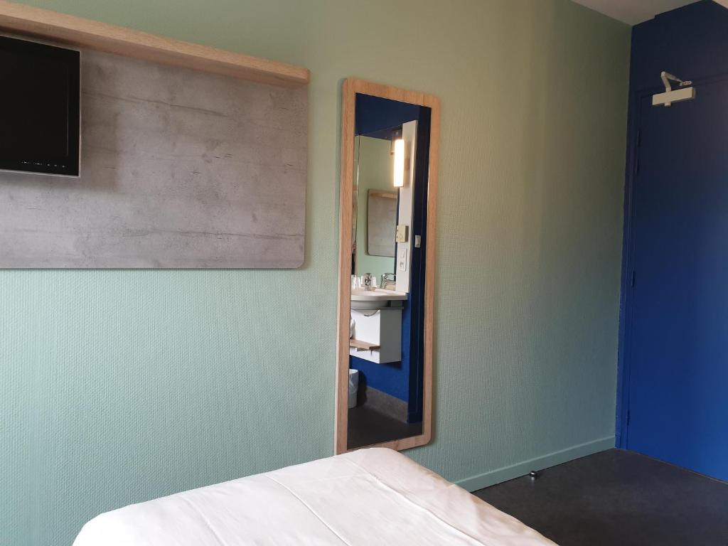 Postel nebo postele na pokoji v ubytování ibis budget Saint Gaudens