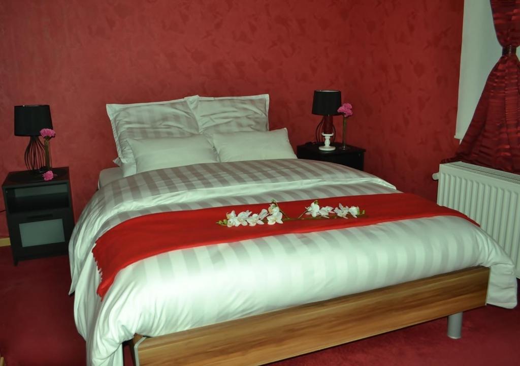 Postel nebo postele na pokoji v ubytování Hotel Het Gasthof