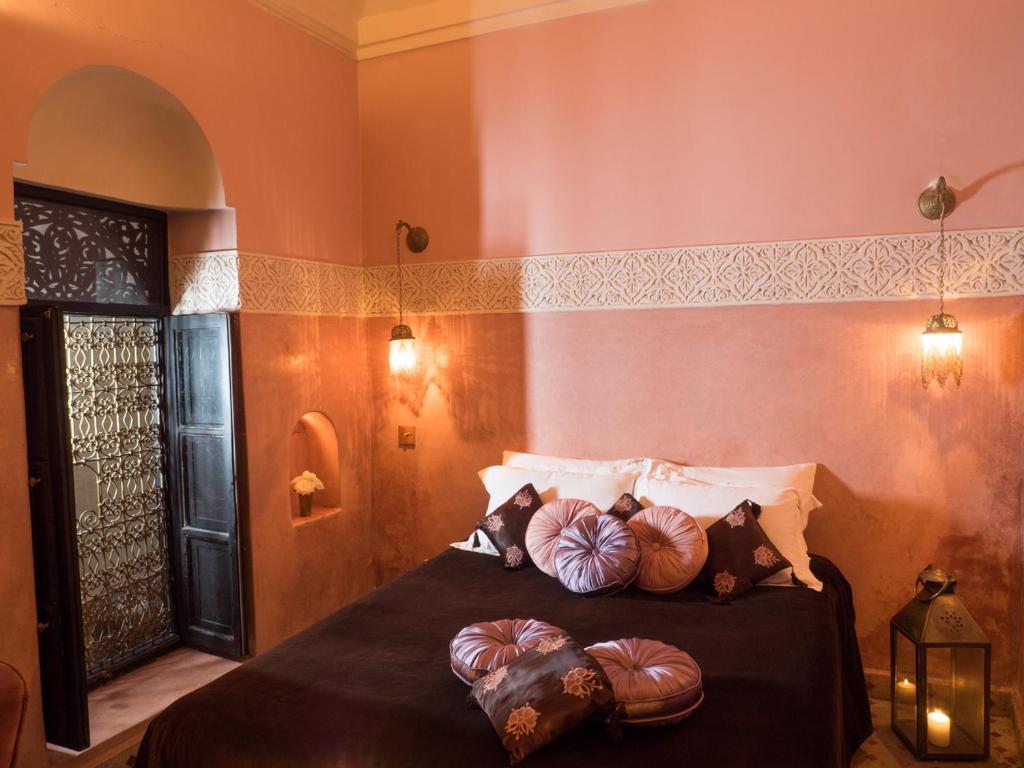 Postel nebo postele na pokoji v ubytování Riad Dar Jaguar