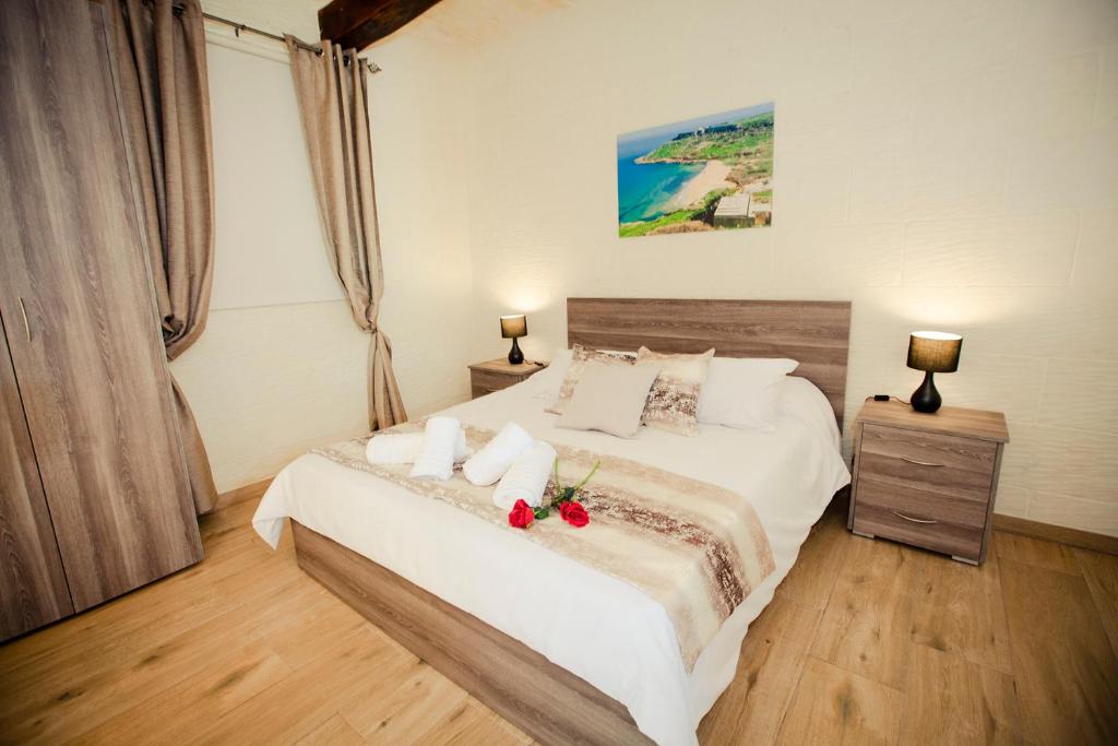 Postel nebo postele na pokoji v ubytování Soleil B&B Gozo