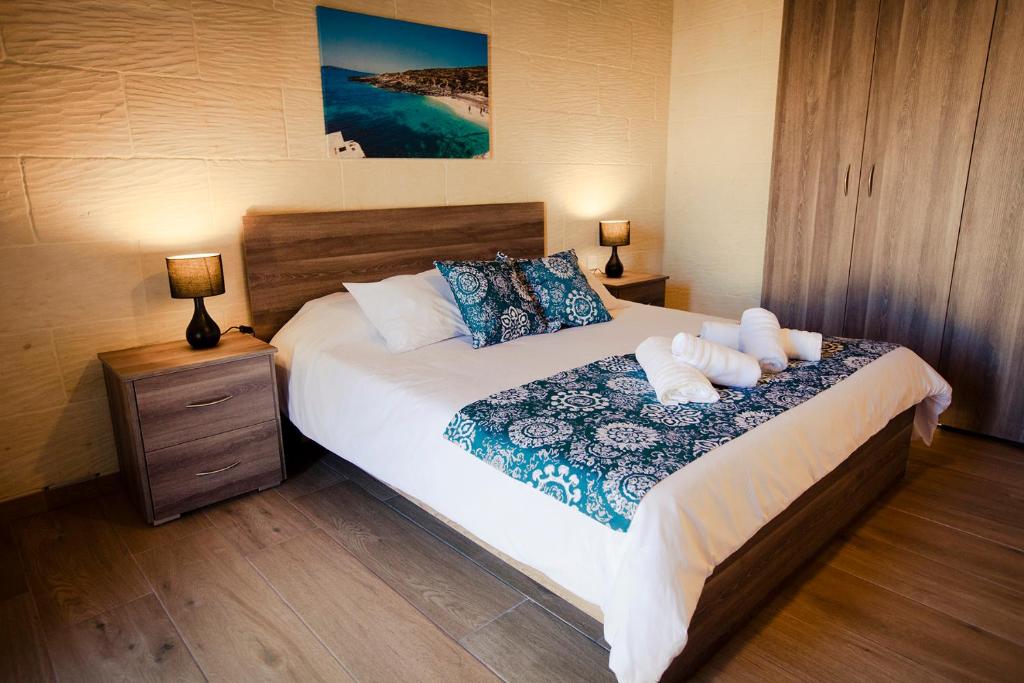 Postel nebo postele na pokoji v ubytování Soleil B&B Gozo