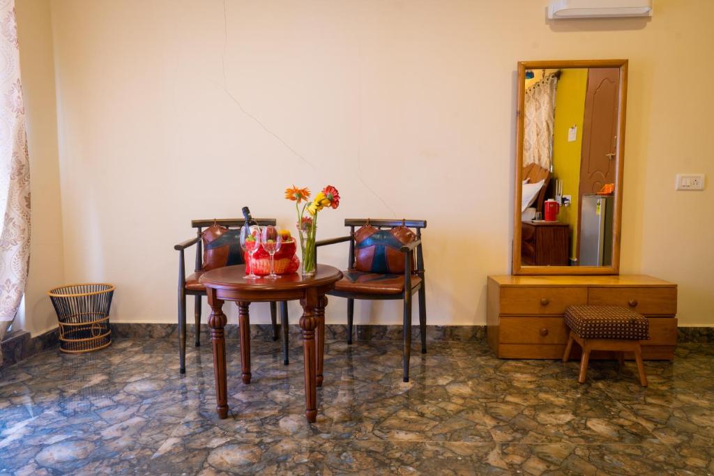 Posezení v ubytování Alcove Resort Vagator