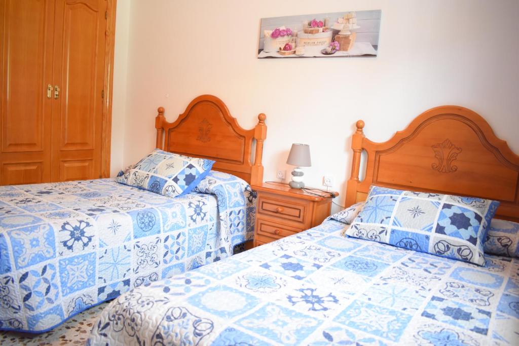 Posteľ alebo postele v izbe v ubytovaní CASA RURAL ALEJO