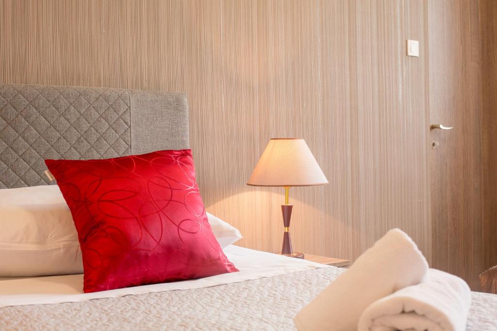 Postel nebo postele na pokoji v ubytování Golden Split Rooms
