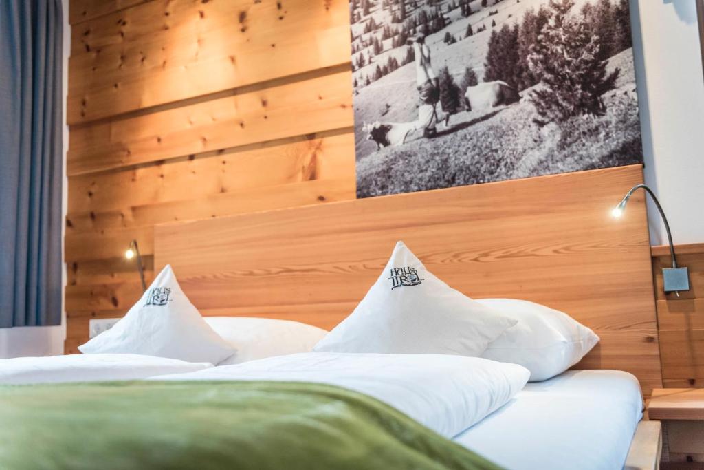 Postel nebo postele na pokoji v ubytování Pension Haus Tirol
