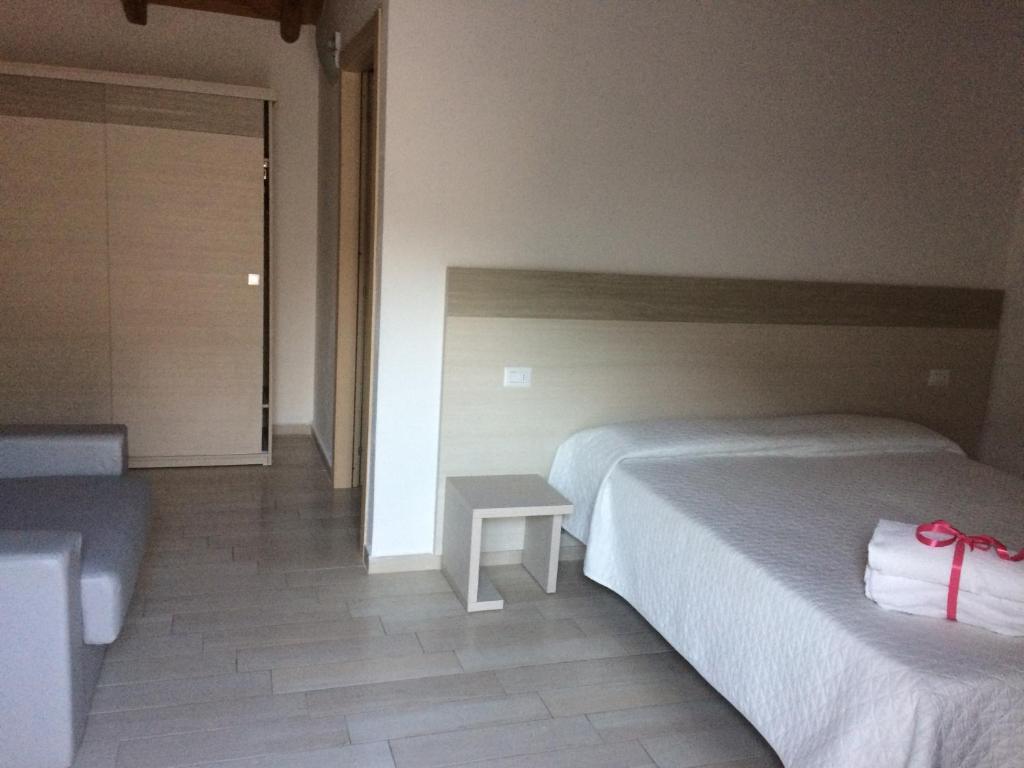 Łóżko lub łóżka w pokoju w obiekcie Sole&Sale