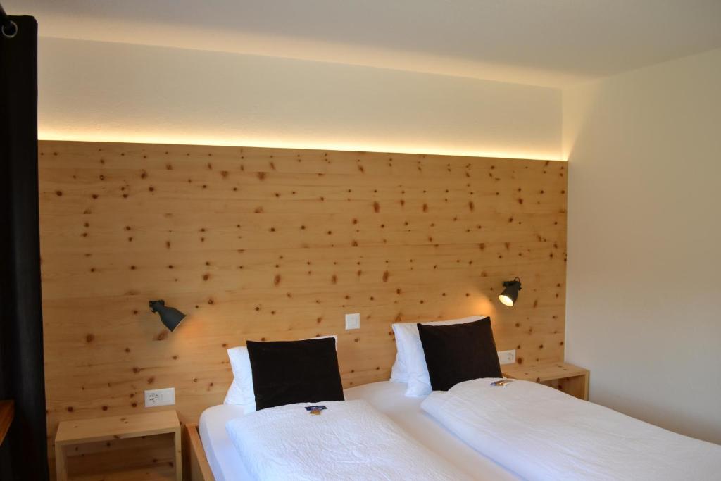 Postel nebo postele na pokoji v ubytování Schorta's Alvetern - Boutique Hotel & Restaurant