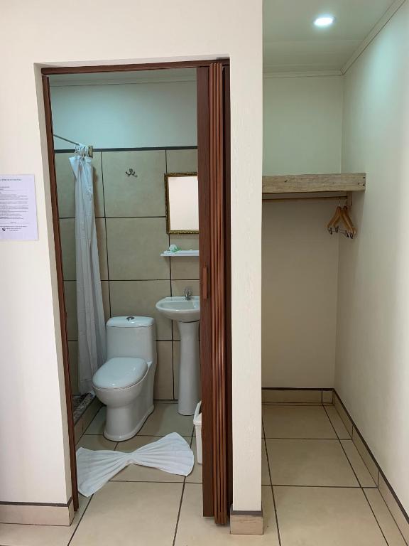 Koupelna v ubytování Le Petit Hotel
