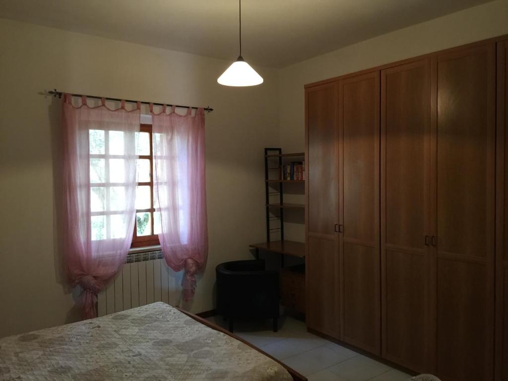 Łóżko lub łóżka w pokoju w obiekcie Il Porto