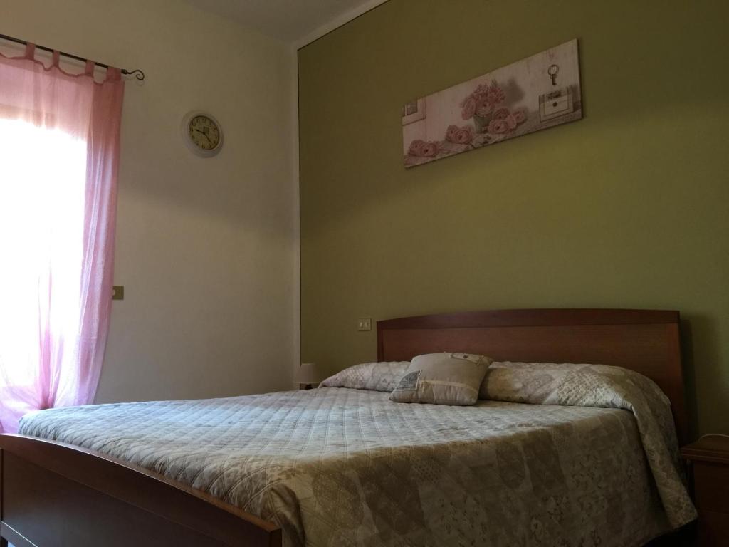 Łóżko lub łóżka w pokoju w obiekcie Il Porto