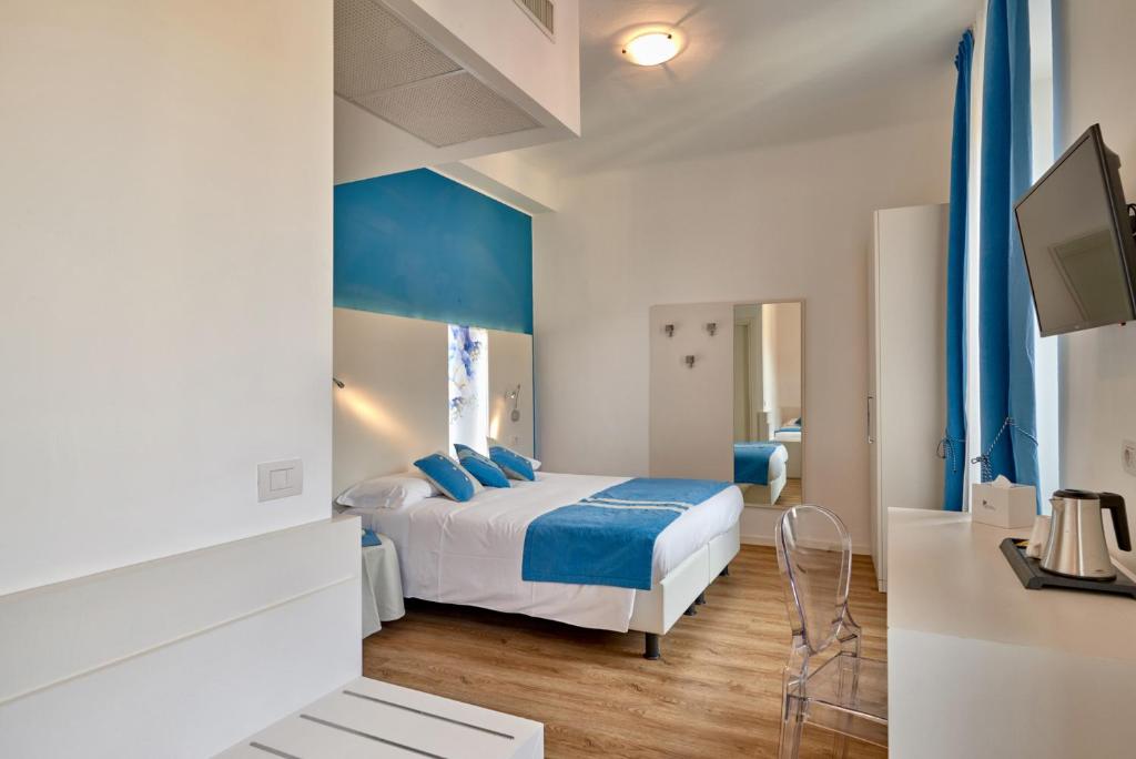 Postel nebo postele na pokoji v ubytování Hotel Bellavista