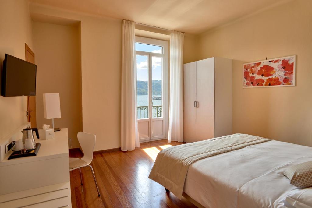 Postel nebo postele na pokoji v ubytování Hotel Bellavista