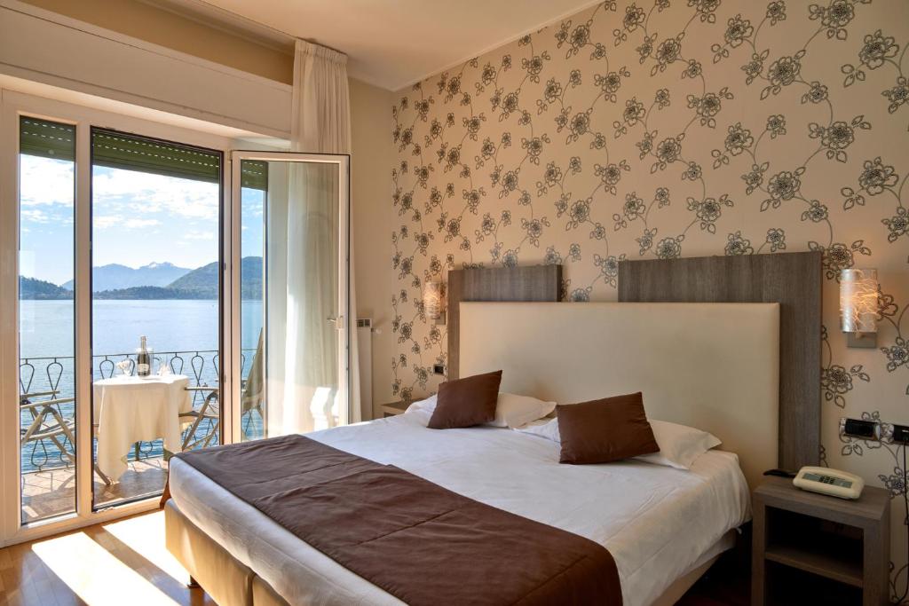 Postel nebo postele na pokoji v ubytování Hotel Bellavista