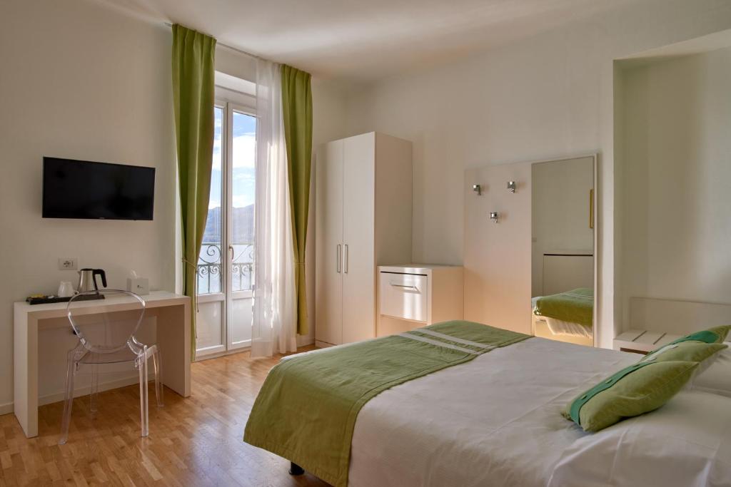 Postel nebo postele na pokoji v ubytování Hotel Bellavista
