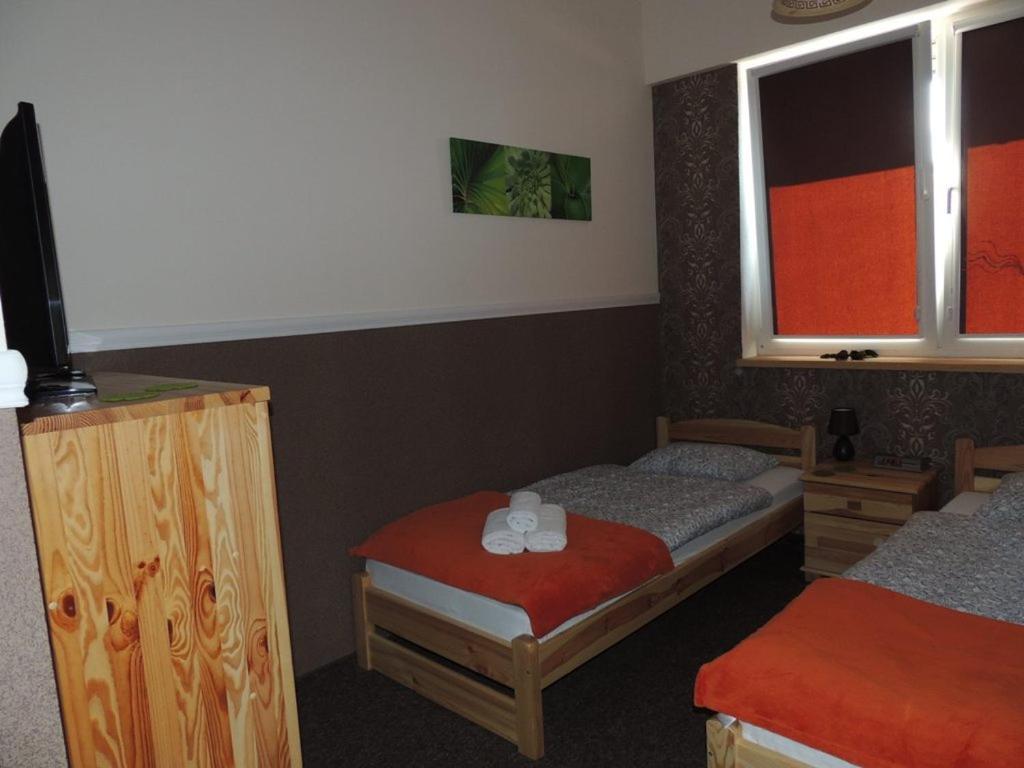 Postel nebo postele na pokoji v ubytování BoomerangHouse