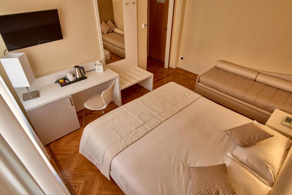 Postel nebo postele na pokoji v ubytování Hotel Bellavista