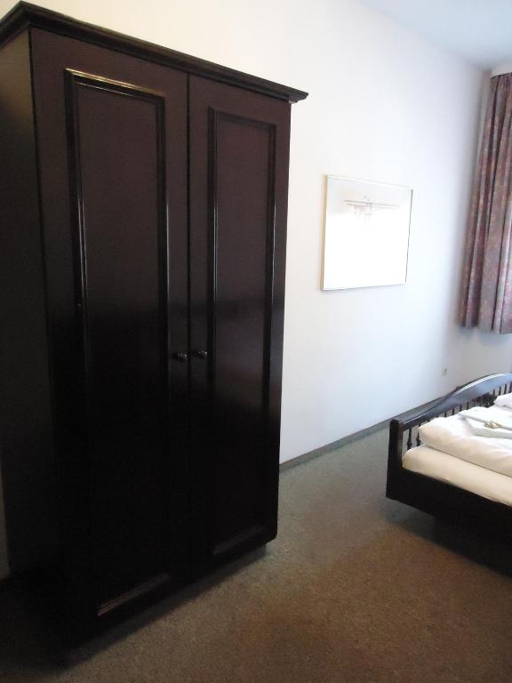 Postel nebo postele na pokoji v ubytování Hotel Marthahaus