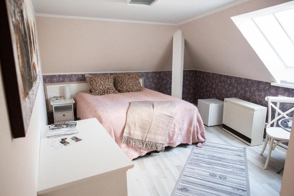 Postel nebo postele na pokoji v ubytování Suviste Guesthouse