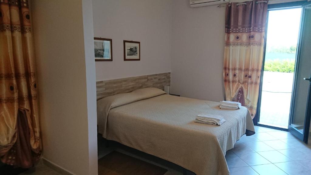 Postel nebo postele na pokoji v ubytování Barbara B&B