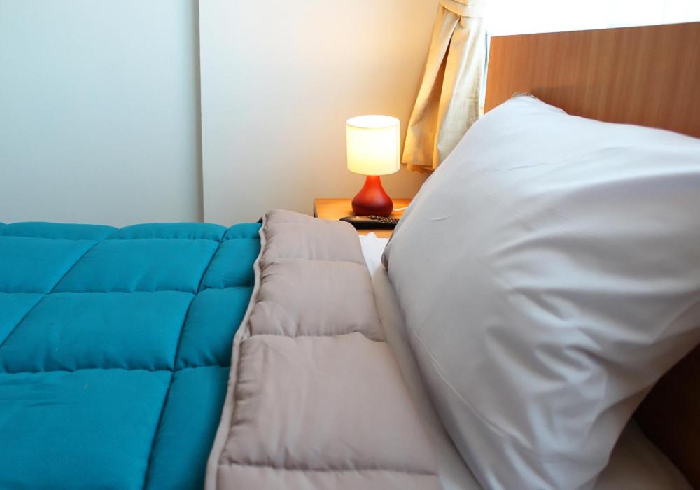 Cama o camas de una habitación en Hotel Romano