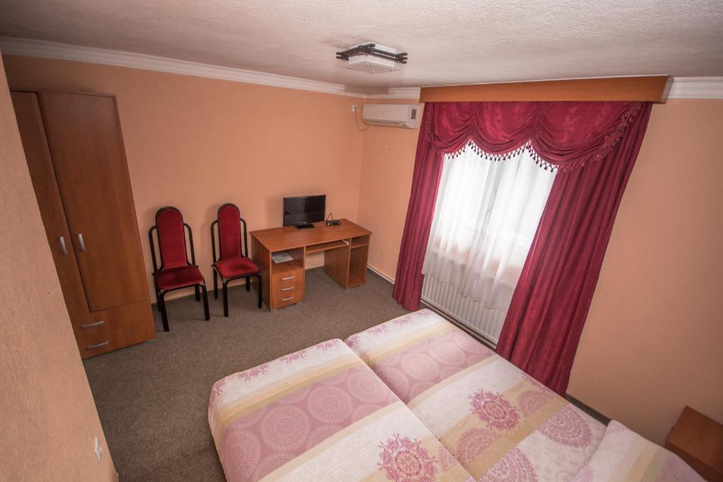 Postel nebo postele na pokoji v ubytování Hotel Drumski Raj