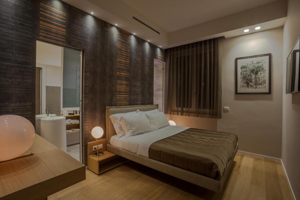 Кровать или кровати в номере MaisonSilvi'