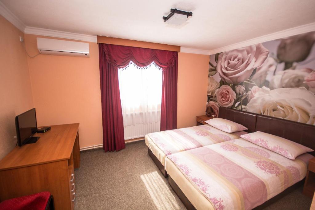 Postel nebo postele na pokoji v ubytování Hotel Drumski Raj
