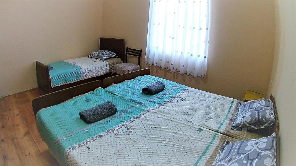 Postel nebo postele na pokoji v ubytování Surmava Palace