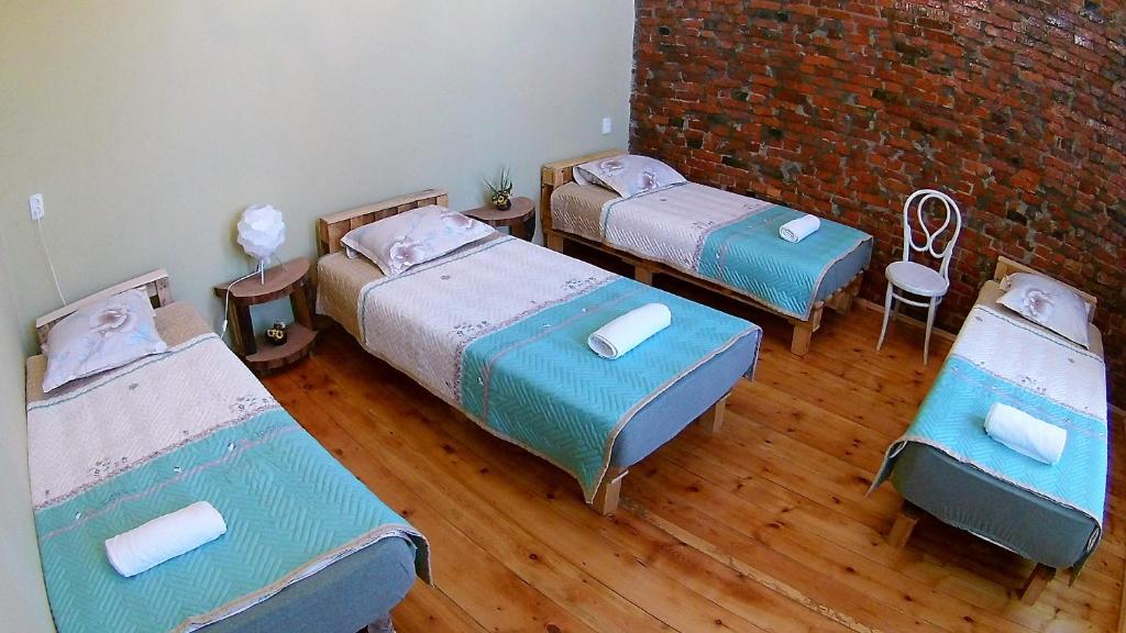Postel nebo postele na pokoji v ubytování Surmava Palace