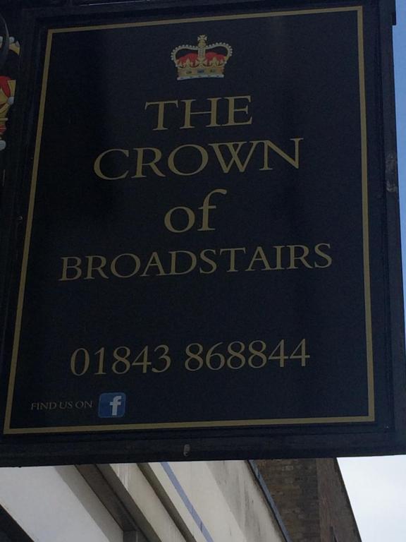 a sign for the crown of brooklands at The Crown Bar & Guesthouse in Broadstairs