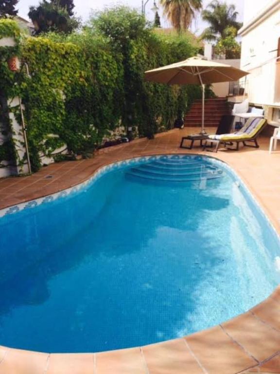 Bazén v ubytování Ideal loft Malaga nebo v jeho okolí