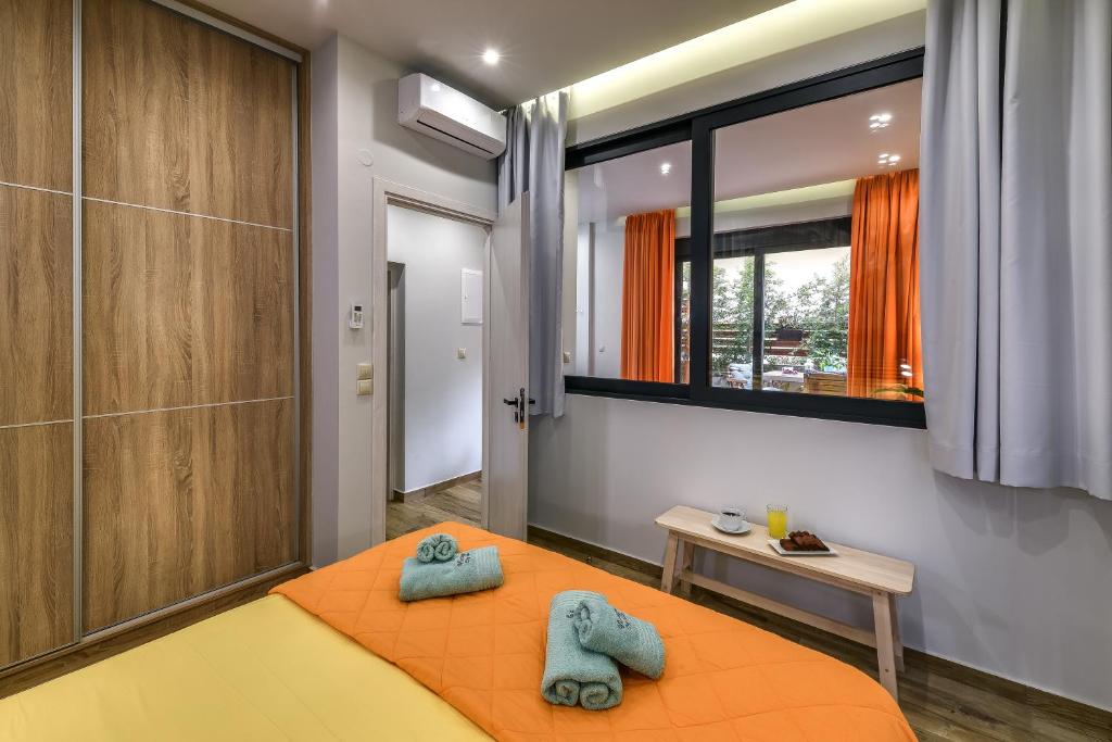 Łóżko lub łóżka w pokoju w obiekcie Vintage City Apartments