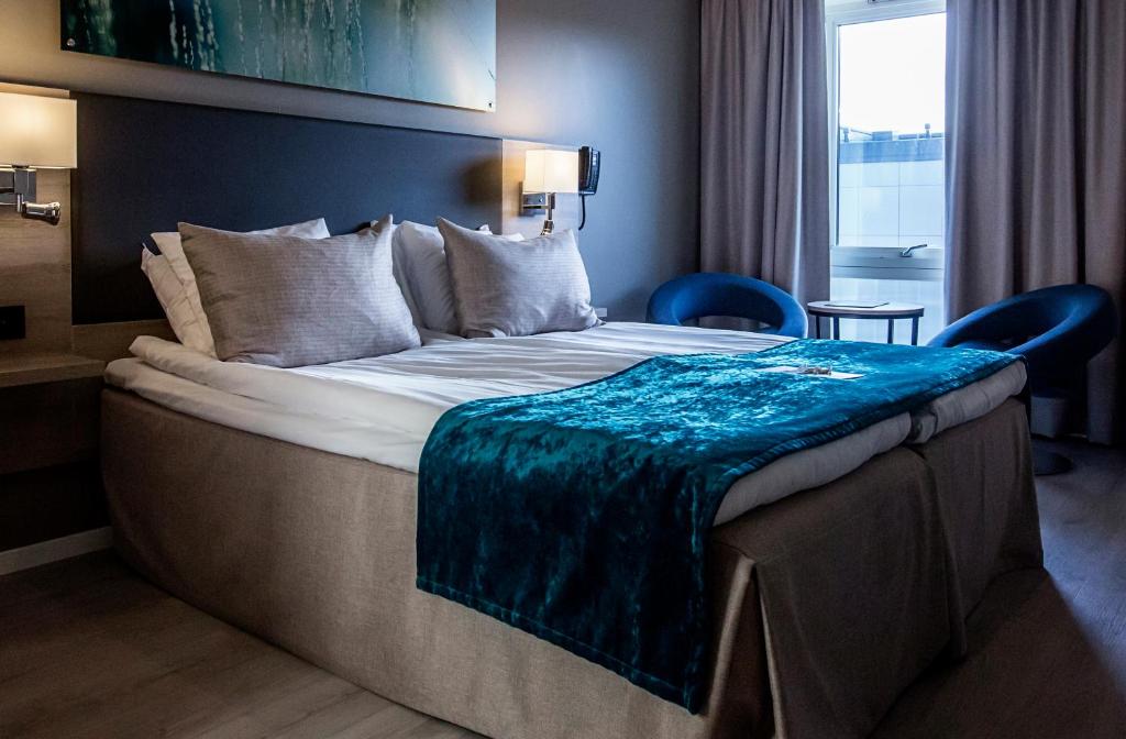 Ένα ή περισσότερα κρεβάτια σε δωμάτιο στο Strömstad Spa & Resort