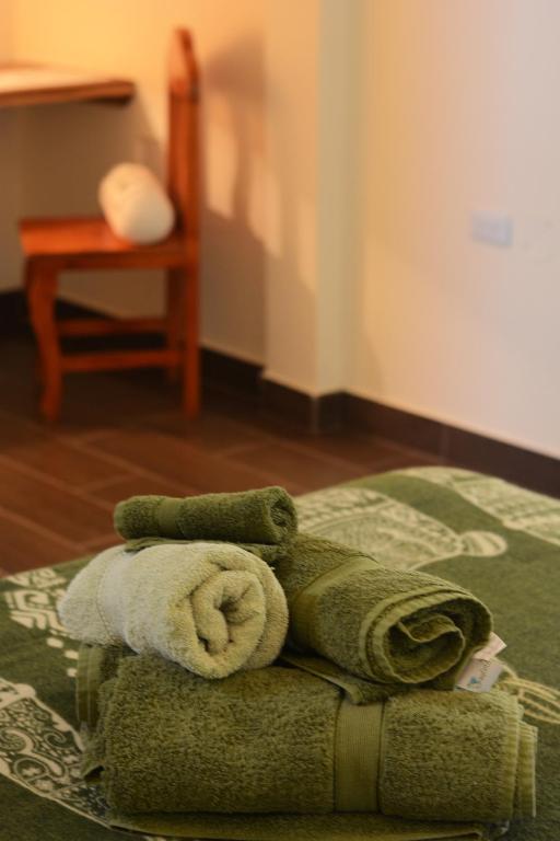 Postel nebo postele na pokoji v ubytování CASITA MADAME