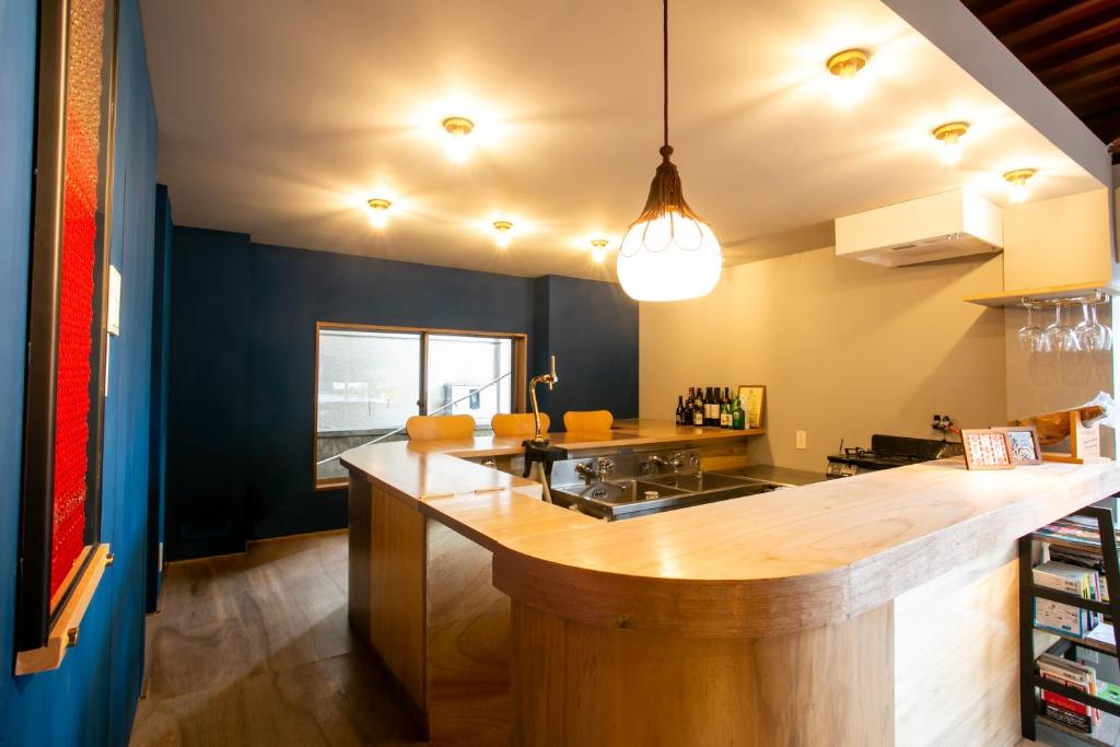 Kuchyň nebo kuchyňský kout v ubytování Guesthouse OYADO SAPPORO
