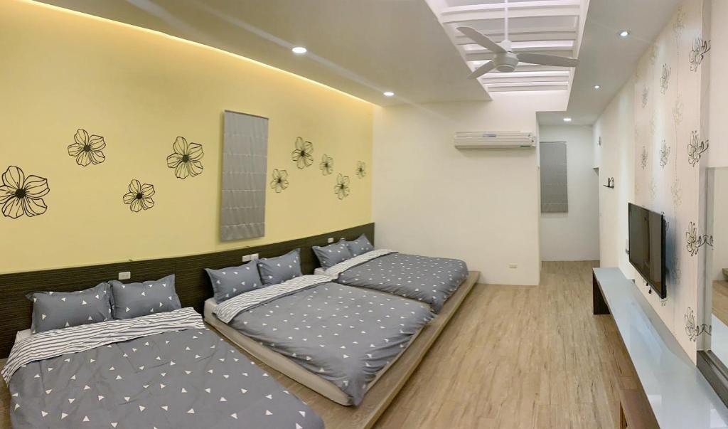 Postel nebo postele na pokoji v ubytování Moumoon B&B