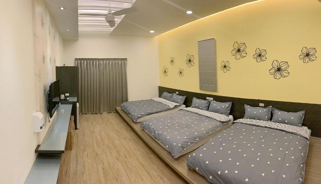 Postel nebo postele na pokoji v ubytování Moumoon B&B