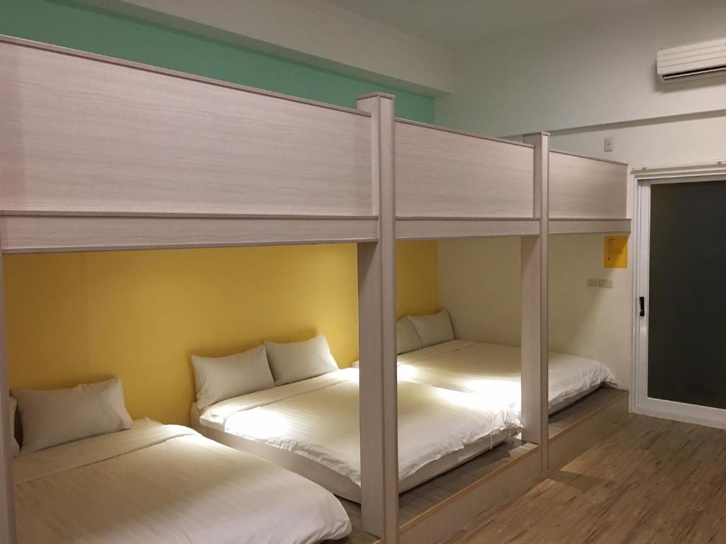 Postel nebo postele na pokoji v ubytování Moumoon B&B