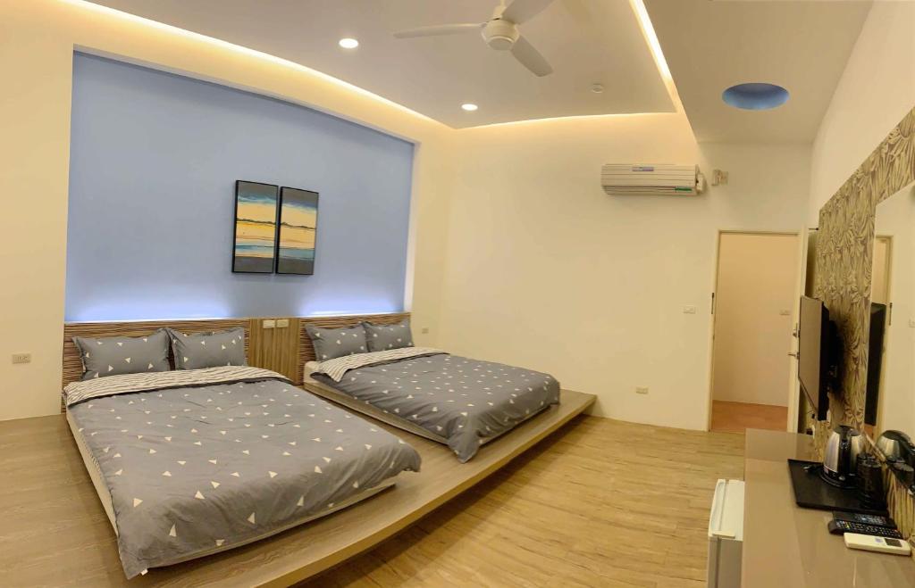 TV a/nebo společenská místnost v ubytování Moumoon B&B