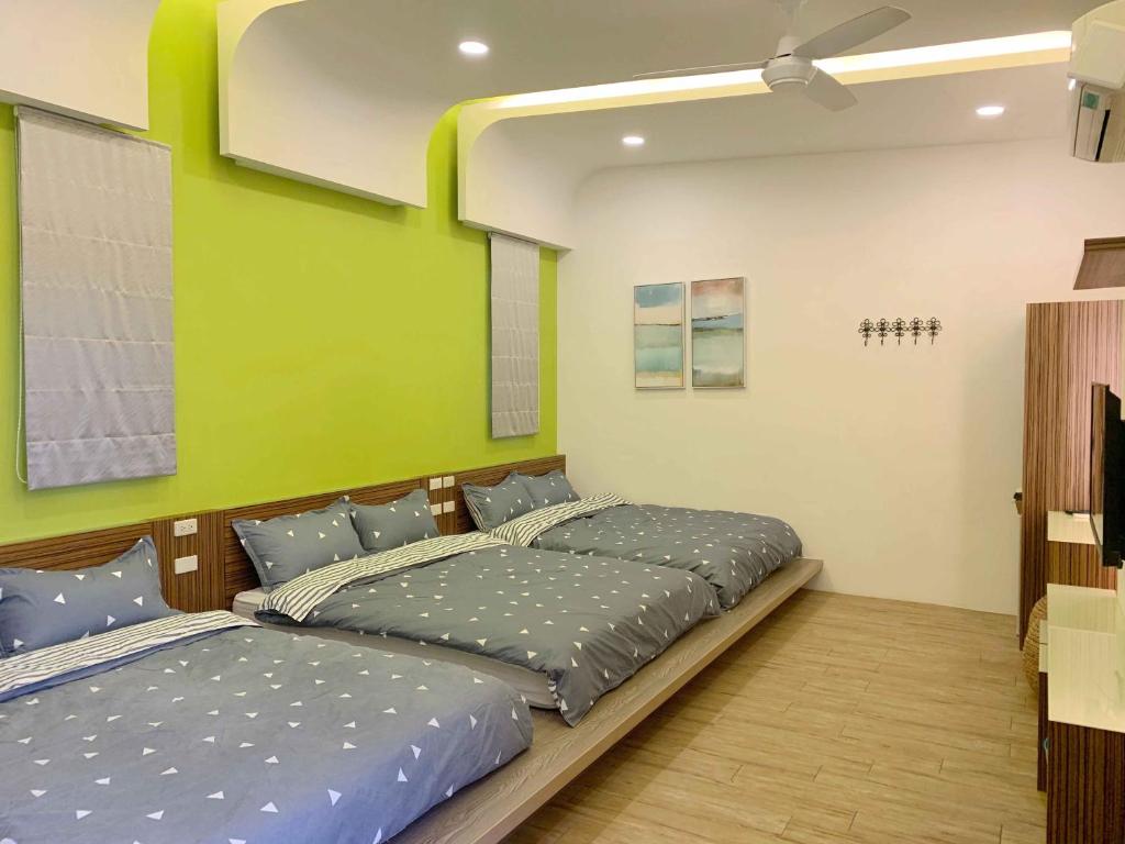 Postel nebo postele na pokoji v ubytování Moumoon B&B