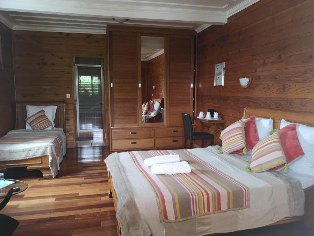 Llit o llits en una habitació de Le papangue