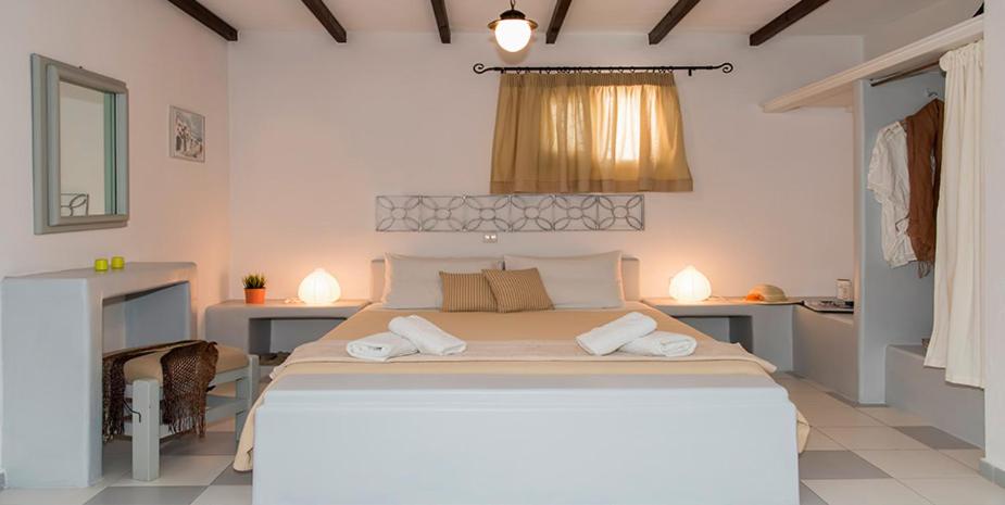 A bed or beds in a room at Villa Mina
