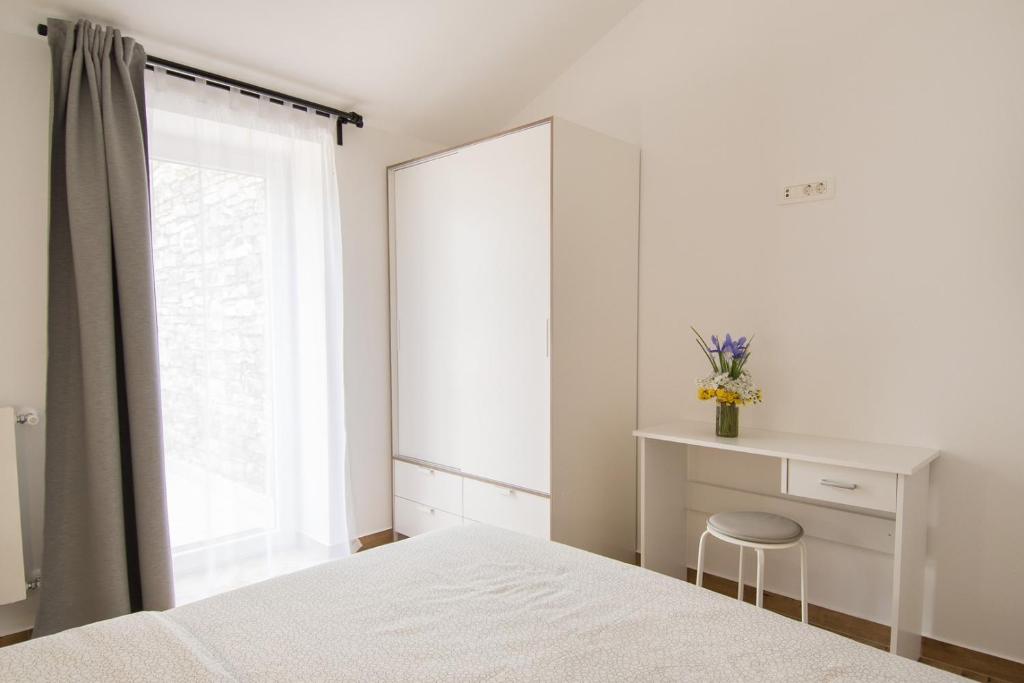 Posteľ alebo postele v izbe v ubytovaní Apartment Bruneta 1 with Sea View