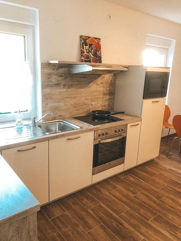 Kuchyň nebo kuchyňský kout v ubytování Creek House