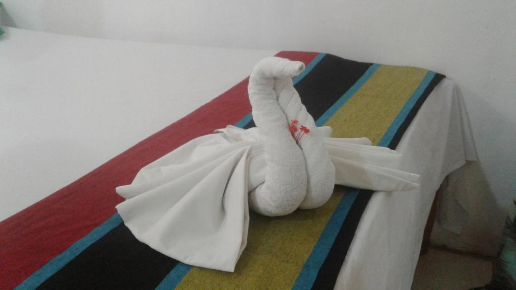 Postel nebo postele na pokoji v ubytování Kalana Homestay