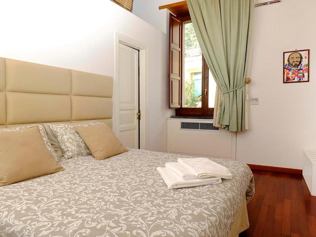 Postel nebo postele na pokoji v ubytování B&B Villa Elisa