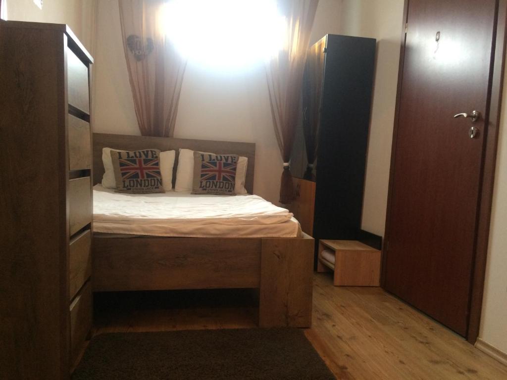 Postel nebo postele na pokoji v ubytování Studio Julius Constanta